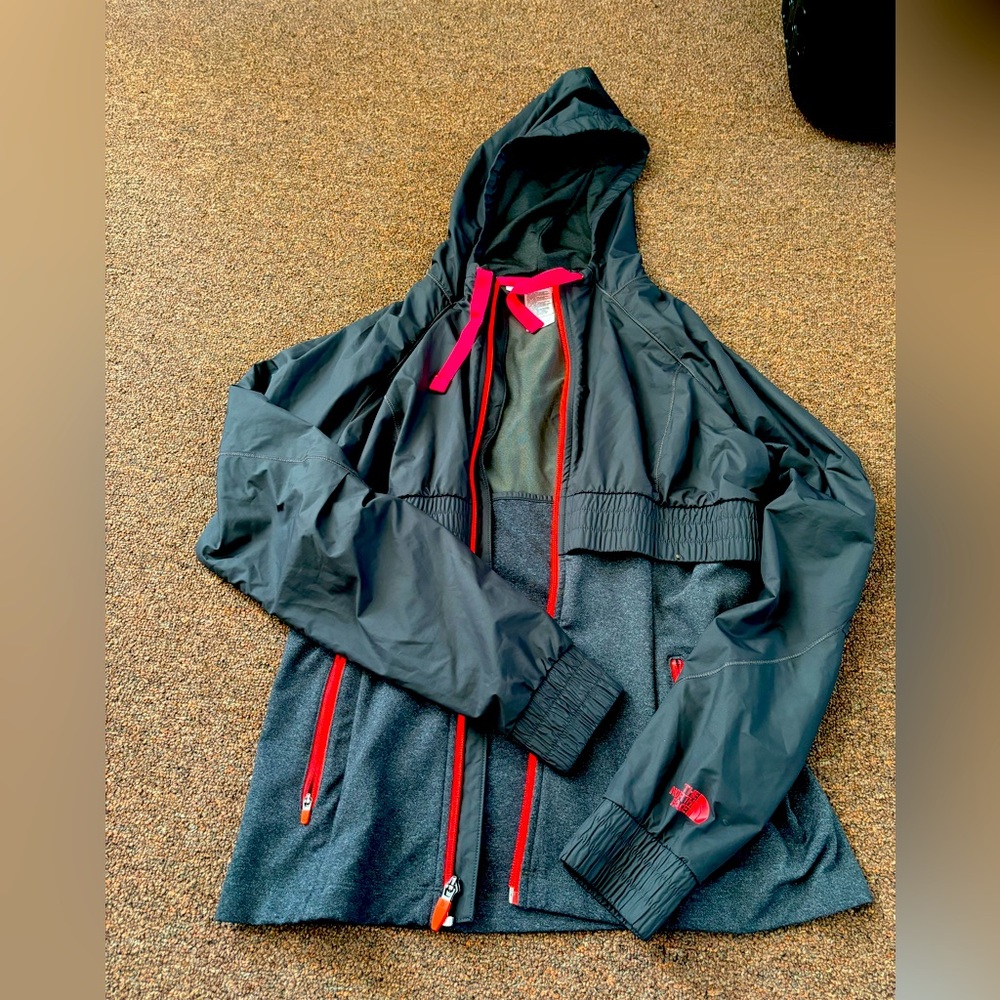 Gray and hot pink running jacket by north face